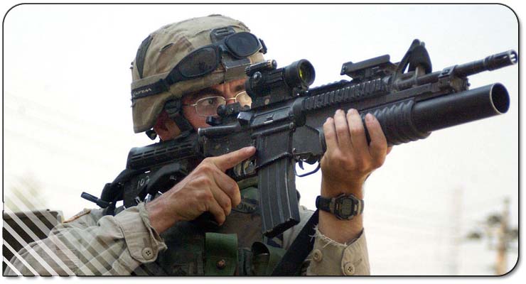 M203