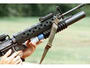M203